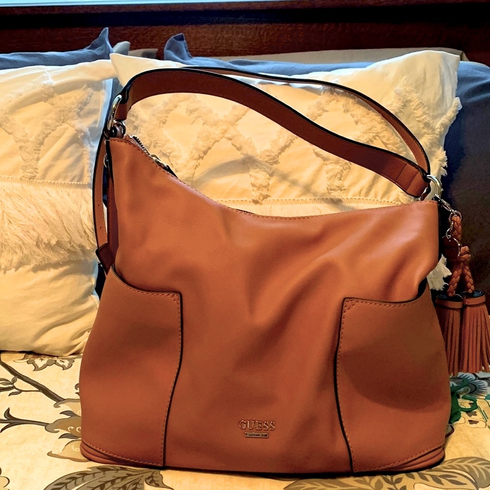 NWOT dusty rose purse by Guess.